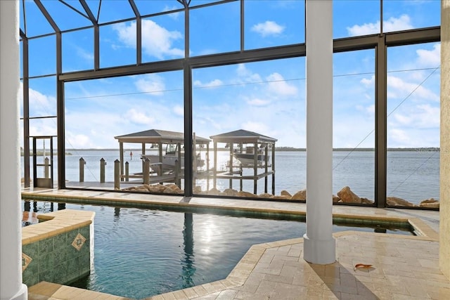 3310 John Anderson Dr, Ormond Beach, FL 32176 - view of dock featuring a water view, boat lift, and an outdoor pool