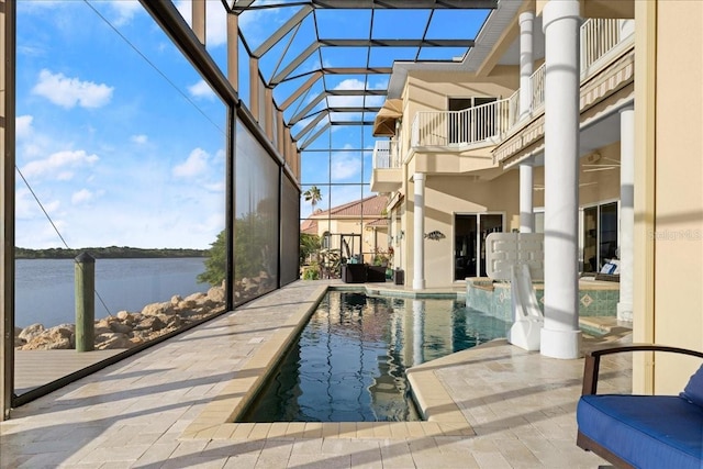3310 John Anderson Dr, Ormond Beach, FL 32176 - pool featuring a patio, a water view, and glass enclosure