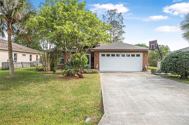 14 Wood Amber Ln, Palm Coast, FL 32164 - view of front of property featuring concrete driveway, an attached garage, a front lawn, brick siding, and fence