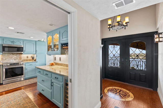 761 Marina Point Dr Unit 7610, Daytona Beach, FL 32114 - entrance foyer with visible vents, recessed lighting, a notable chandelier, and dark wood finished floors