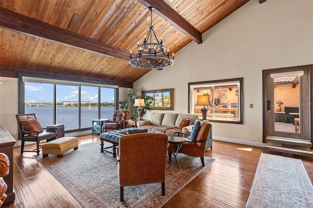 761 Marina Point Dr Unit 7610, Daytona Beach, FL 32114 - living room featuring beamed ceiling, a water view, a chandelier, baseboards, and hardwood / wood-style flooring