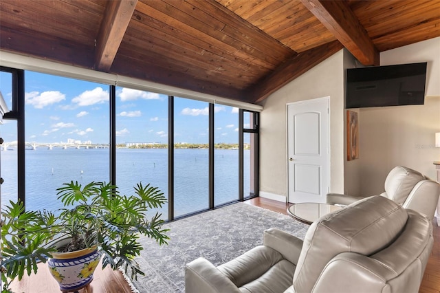 761 Marina Point Dr Unit 7610, Daytona Beach, FL 32114 - living room with a water view, vaulted ceiling with beams, wooden ceiling, and wood finished floors