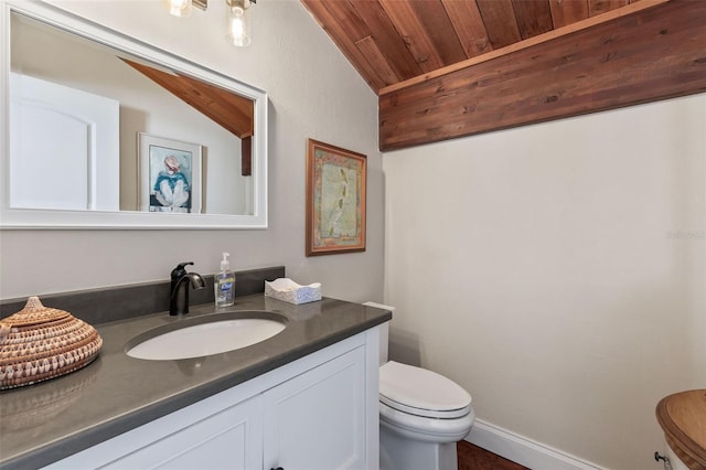 761 Marina Point Dr Unit 7610, Daytona Beach, FL 32114 - bathroom featuring baseboards, toilet, wood ceiling, vanity, and vaulted ceiling