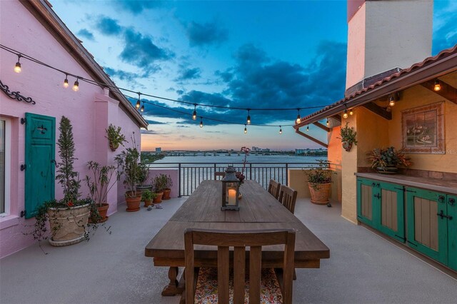 761 Marina Point Dr Unit 7610, Daytona Beach, FL 32114 - patio terrace at dusk with outdoor dining space