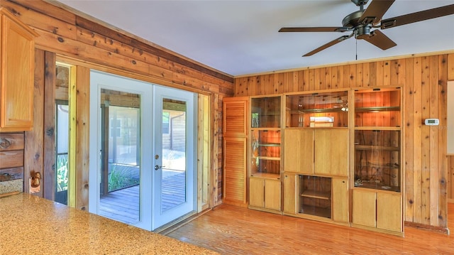 160 Rose Ave, Lake Helen, FL 32744 - entryway featuring wooden walls, a ceiling fan, light wood finished floors, and french doors
