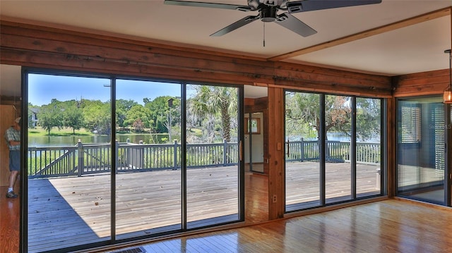 160 Rose Ave, Lake Helen, FL 32744 - entryway featuring wood finished floors, wood walls, ceiling fan, and plenty of natural light