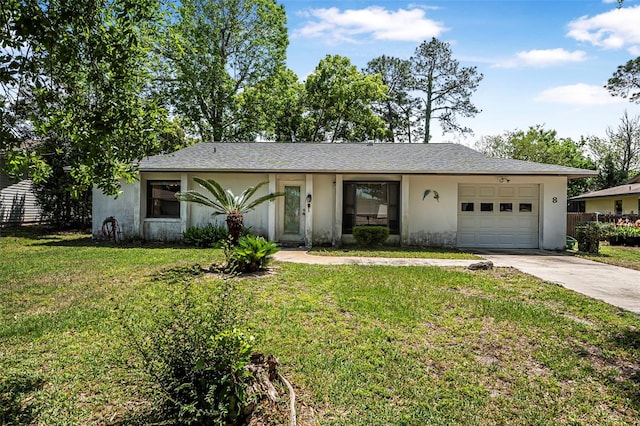 8 Faith Ln, Palm Coast, FL 32137 - ranch-style house with a garage, stucco siding, driveway, and a front lawn