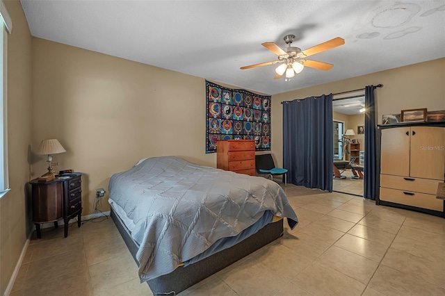 8 Faith Ln, Palm Coast, FL 32137 - bedroom featuring light tile patterned floors, a ceiling fan, and multiple windows