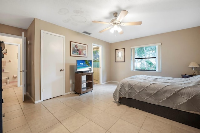 8 Faith Ln, Palm Coast, FL 32137 - bedroom with light tile patterned floors, visible vents, baseboards, and ceiling fan