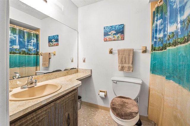 8 Faith Ln, Palm Coast, FL 32137 - full bathroom featuring tile patterned flooring, vanity, baseboards, and toilet