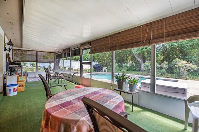 8 Faith Ln, Palm Coast, FL 32137 - sunroom / solarium with plenty of natural light and outdoor dining area