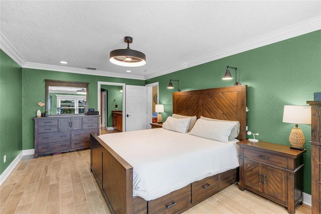 bedroom featuring baseboards, ornamental molding, wood finish floors, a textured ceiling, and visible vents