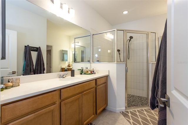 full bathroom with a shower stall, tile patterned flooring, recessed lighting, and vanity