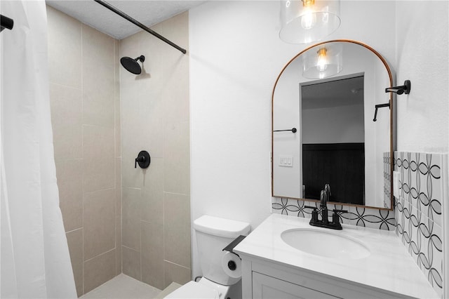 1202 Anderson St, Deltona, FL 32725 - bathroom featuring backsplash, vanity, a tile shower, and toilet