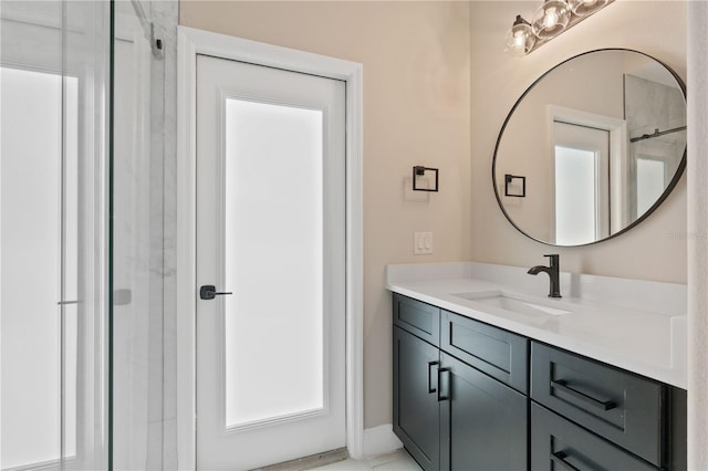full bathroom with a shower, a wealth of natural light, baseboards, and vanity
