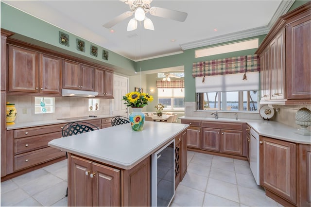 kitchen featuring black electric cooktop, wine cooler, tasteful backsplash, ceiling fan, and light countertops