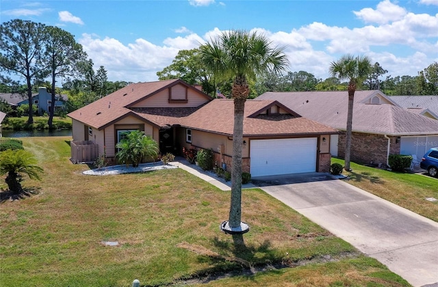 133 Wood Ibis Ct, Daytona Beach, FL 32119 - single story home featuring a front yard, an attached garage, a shingled roof, and concrete driveway