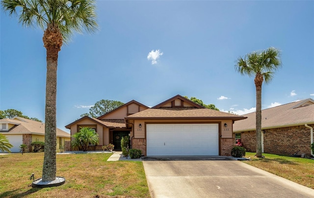 133 Wood Ibis Ct, Daytona Beach, FL 32119 - ranch-style home with a garage, concrete driveway, a front lawn, and brick siding