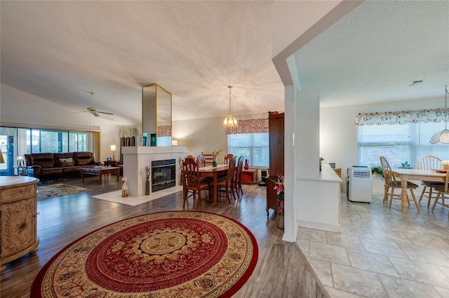 133 Wood Ibis Ct, Daytona Beach, FL 32119 - interior space with wood finished floors, an inviting chandelier, and plenty of natural light