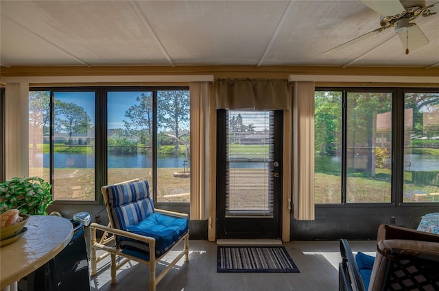 133 Wood Ibis Ct, Daytona Beach, FL 32119 - sunroom / solarium featuring a ceiling fan, a wealth of natural light, and a water view