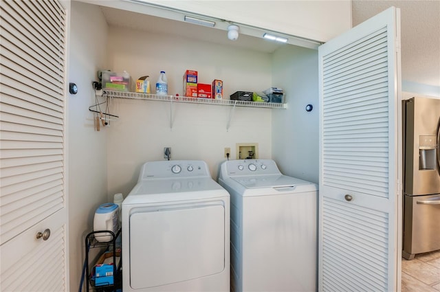 133 Wood Ibis Ct, Daytona Beach, FL 32119 - laundry area featuring separate washer and dryer and laundry area