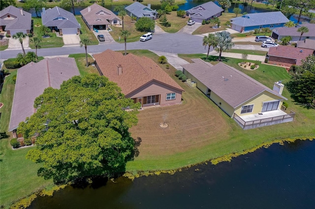 133 Wood Ibis Ct, Daytona Beach, FL 32119 - birds eye view of property featuring a water view and a residential view