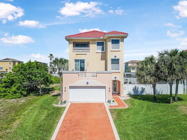 3817 Islamorada Dr, Ormond Beach, FL 32176 - view of front of home featuring stucco siding, an attached garage, a tile roof, and concrete driveway