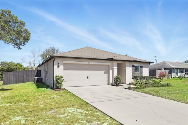 223 Courtland Blvd, Deltona, FL 32738 - single story home with concrete driveway, stucco siding, a front yard, a garage, and fence