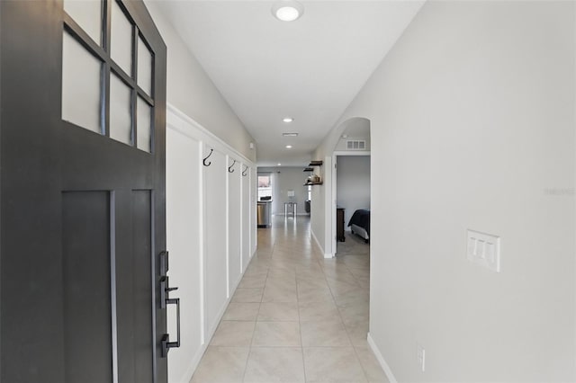 223 Courtland Blvd, Deltona, FL 32738 - hallway featuring visible vents, baseboards, recessed lighting, and light tile patterned floors
