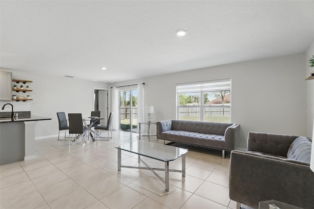 223 Courtland Blvd, Deltona, FL 32738 - living area featuring light tile patterned floors, baseboards, visible vents, and recessed lighting