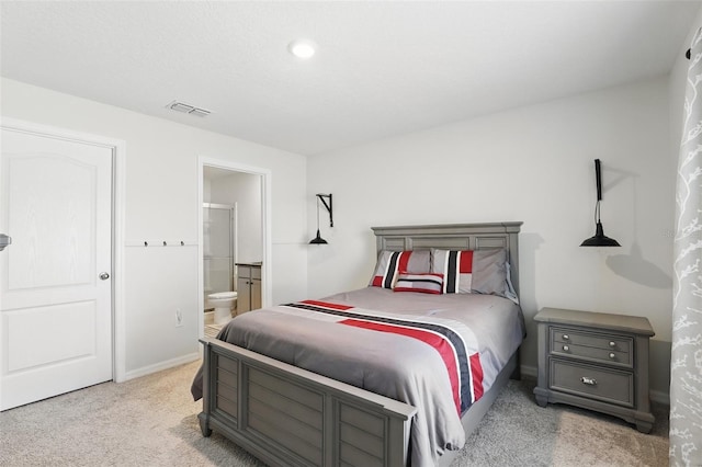 223 Courtland Blvd, Deltona, FL 32738 - bedroom featuring visible vents, baseboards, connected bathroom, and light carpet