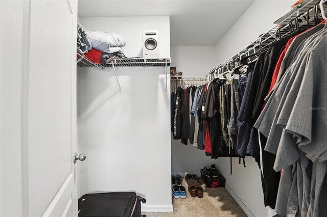 223 Courtland Blvd, Deltona, FL 32738 - walk in closet featuring carpet