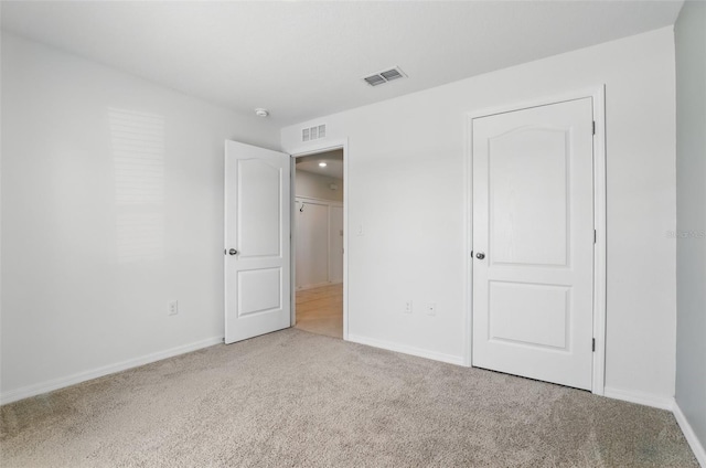 223 Courtland Blvd, Deltona, FL 32738 - unfurnished bedroom featuring visible vents, baseboards, and carpet floors