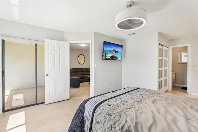 bedroom featuring visible vents