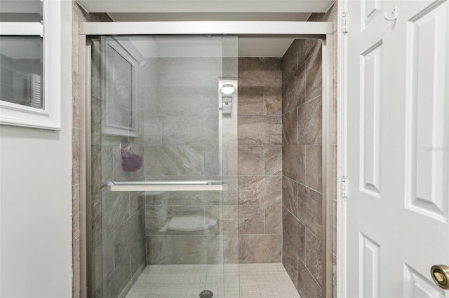 full bath featuring a stall shower