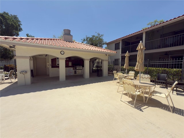 view of patio featuring fence
