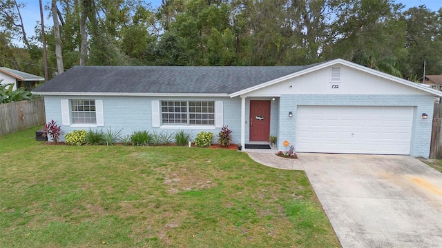 732 Mockingbird Ln, Deland, FL 32720 - ranch-style home featuring an attached garage, driveway, a front yard, and brick siding