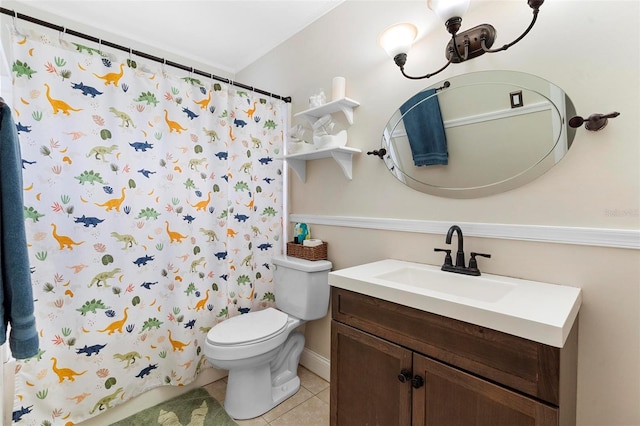 732 Mockingbird Ln, Deland, FL 32720 - bathroom with toilet, tile patterned floors, vanity, and a shower with shower curtain