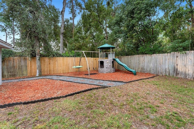 732 Mockingbird Ln, Deland, FL 32720 - view of playground featuring a fenced backyard