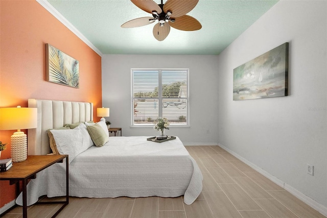 bedroom featuring baseboards and a ceiling fan