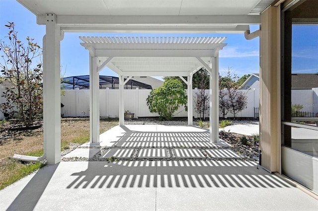 view of patio / terrace featuring a fenced backyard and a pergola