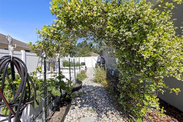 view of yard with a fenced backyard