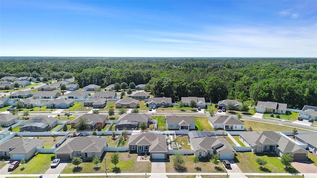 aerial view with a view of trees and a residential view
