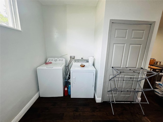 606 W Voorhis Ave, Deland, FL 32720 - washroom featuring dark wood finished floors, baseboards, laundry area, and washer and clothes dryer