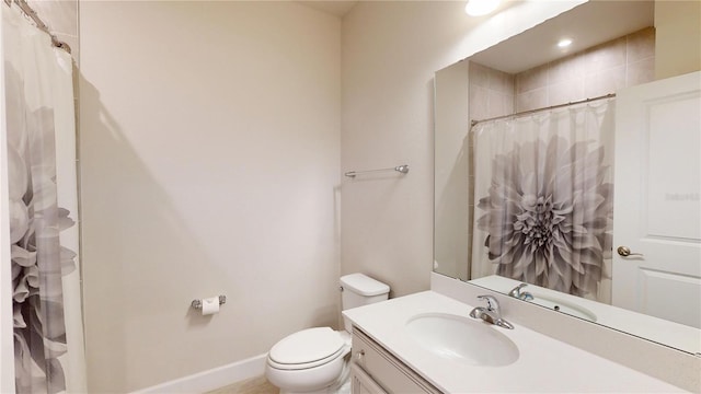 1002 Chelan Falls Dr, Deland, FL 32724 - bathroom with baseboards, curtained shower, vanity, and toilet