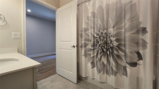 1002 Chelan Falls Dr, Deland, FL 32724 - bathroom with baseboards and vanity