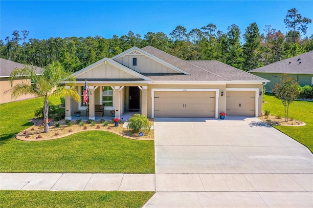 2901 Monaghan Dr, Ormond Beach, FL 32174 - craftsman-style home with an attached garage, a porch, a front yard, and concrete driveway