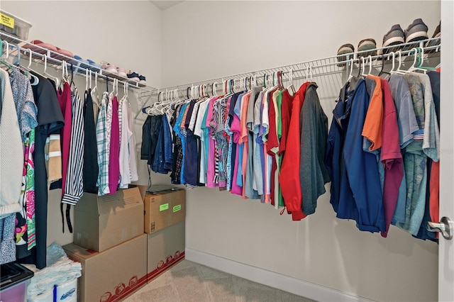2901 Monaghan Dr, Ormond Beach, FL 32174 - walk in closet with carpet floors