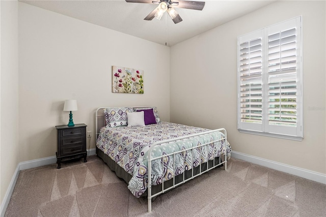 2901 Monaghan Dr, Ormond Beach, FL 32174 - carpeted bedroom featuring baseboards and a ceiling fan