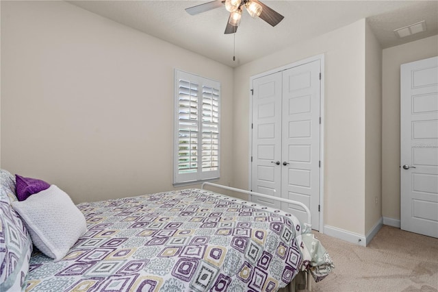2901 Monaghan Dr, Ormond Beach, FL 32174 - bedroom featuring baseboards, carpet floors, visible vents, and a closet